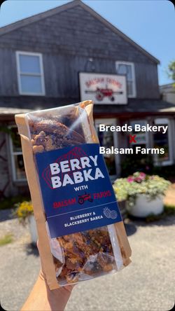 Berry Babka with blueberry and blackberry from Breads Bakery in collaboration with Balsam Farms displayed outdoors.