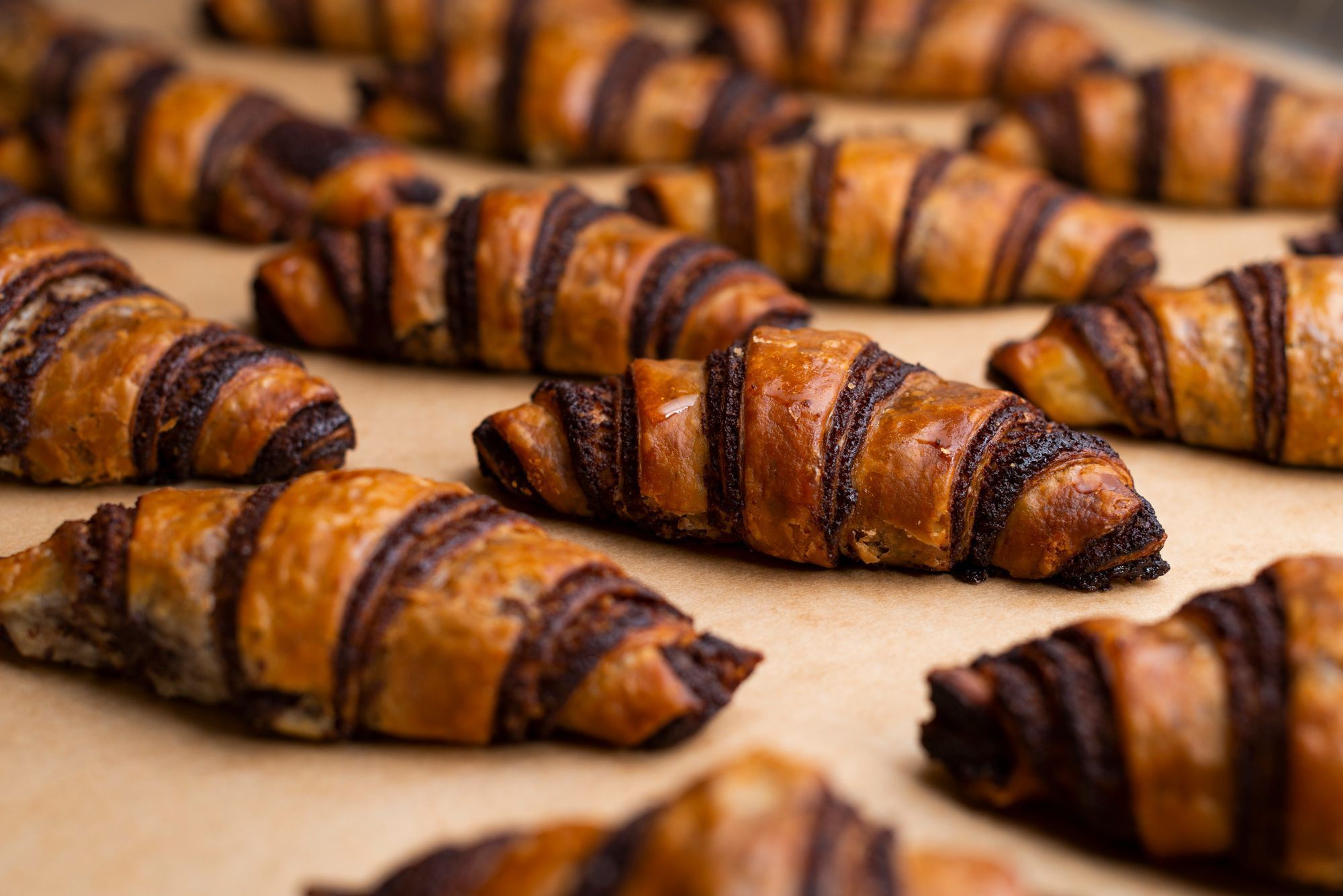 Freshly baked croissants with chocolate filling, a popular choice at Breads Bakery.