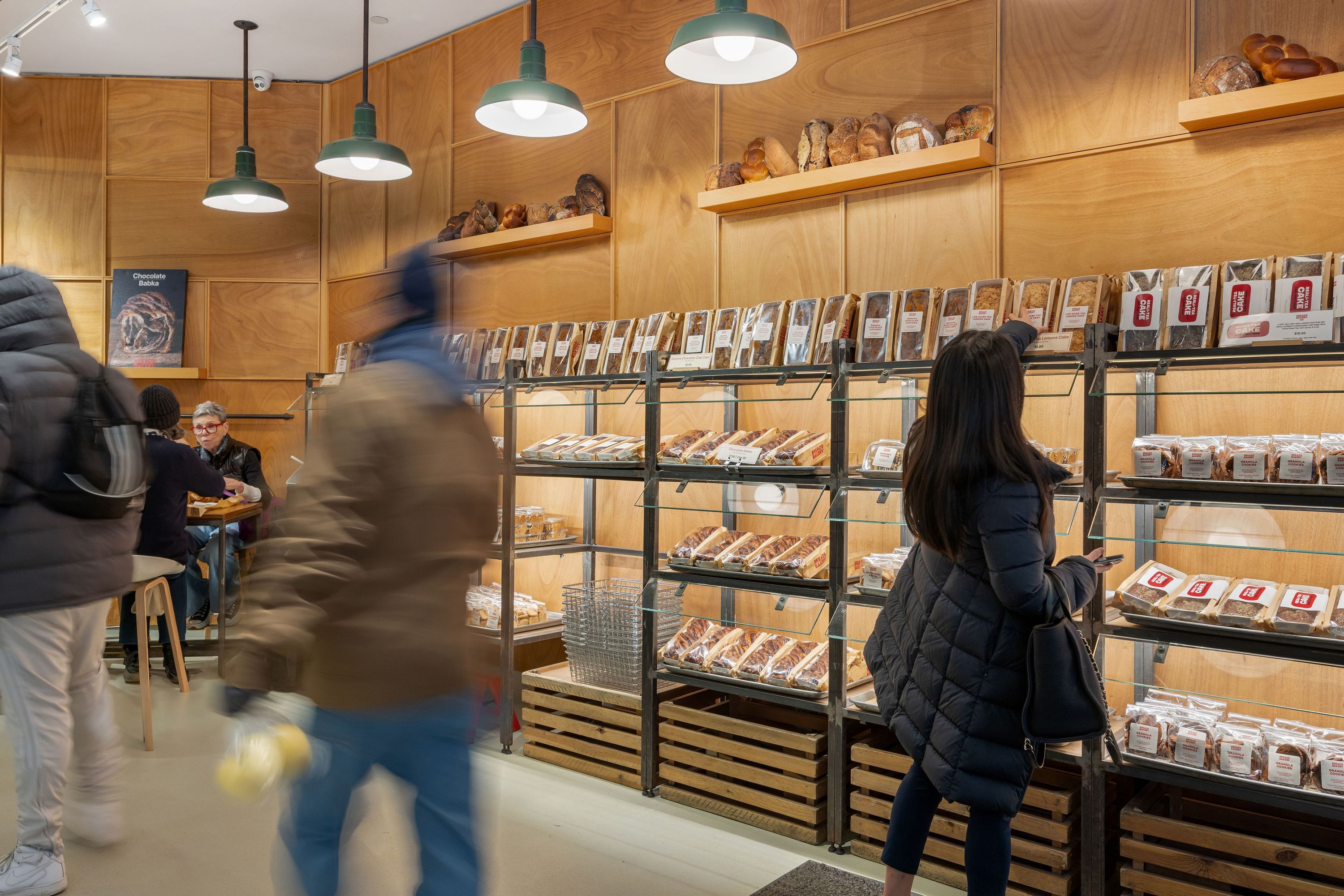 Freshly baked breads and pastries displayed in a cozy bakery setting at Breads Bakery.