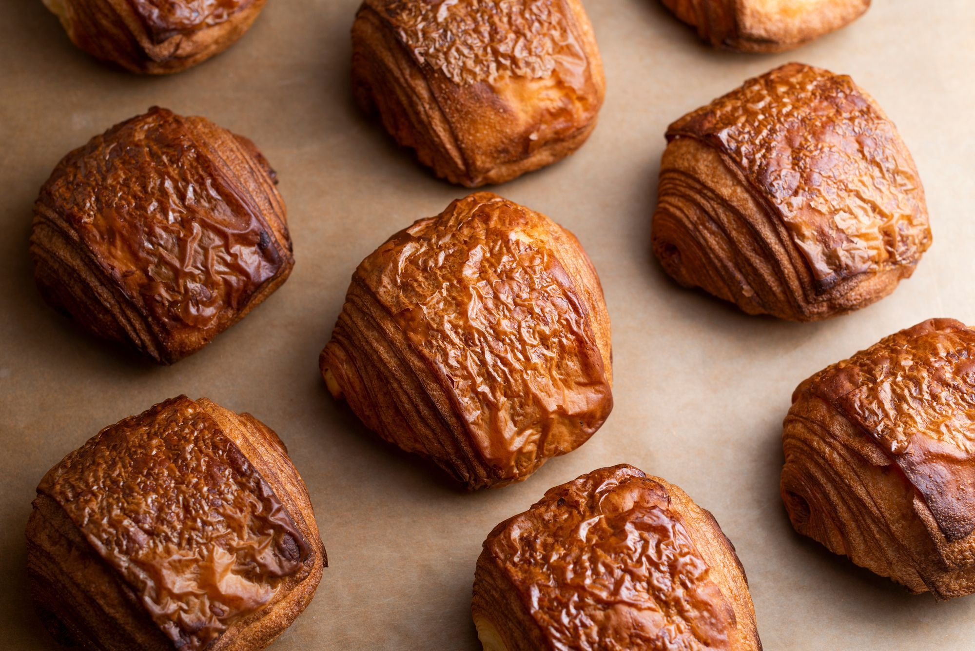 Freshly baked pastries from Breads Bakery showcasing a golden flaky texture.
